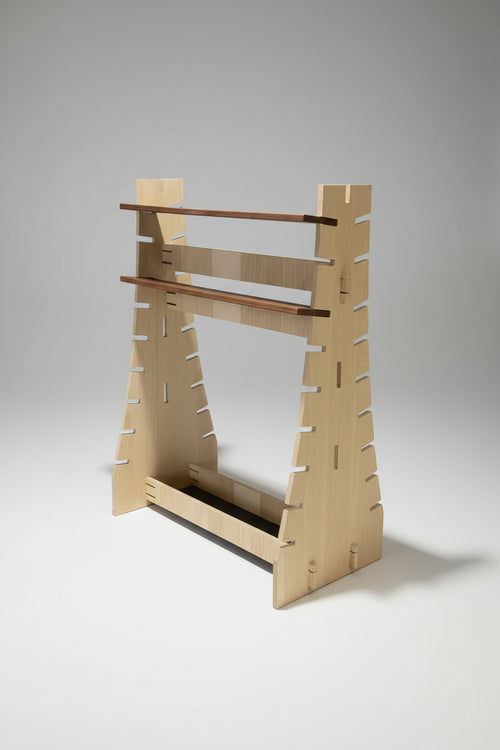 Wooden wall-mounted storage rack with multiple shelves on a black background